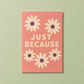 Just Because card: five flat daisies with cream petals and plum centres on a coral A6 card