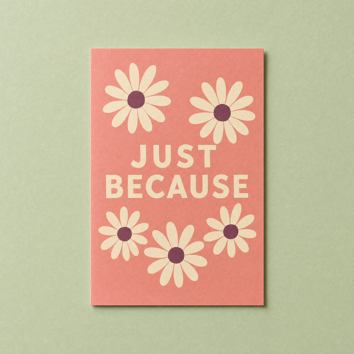 Just Because card: five flat daisies with cream petals and plum centres on a coral A6 card