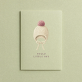 Hello Little One card: a knitted cream bonnet with a dusty rose pompom painted on a pale sage A6 card