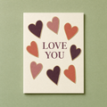 Paper Hearts card: nine hand-cut paper hearts outlined in gold foil on a cream card