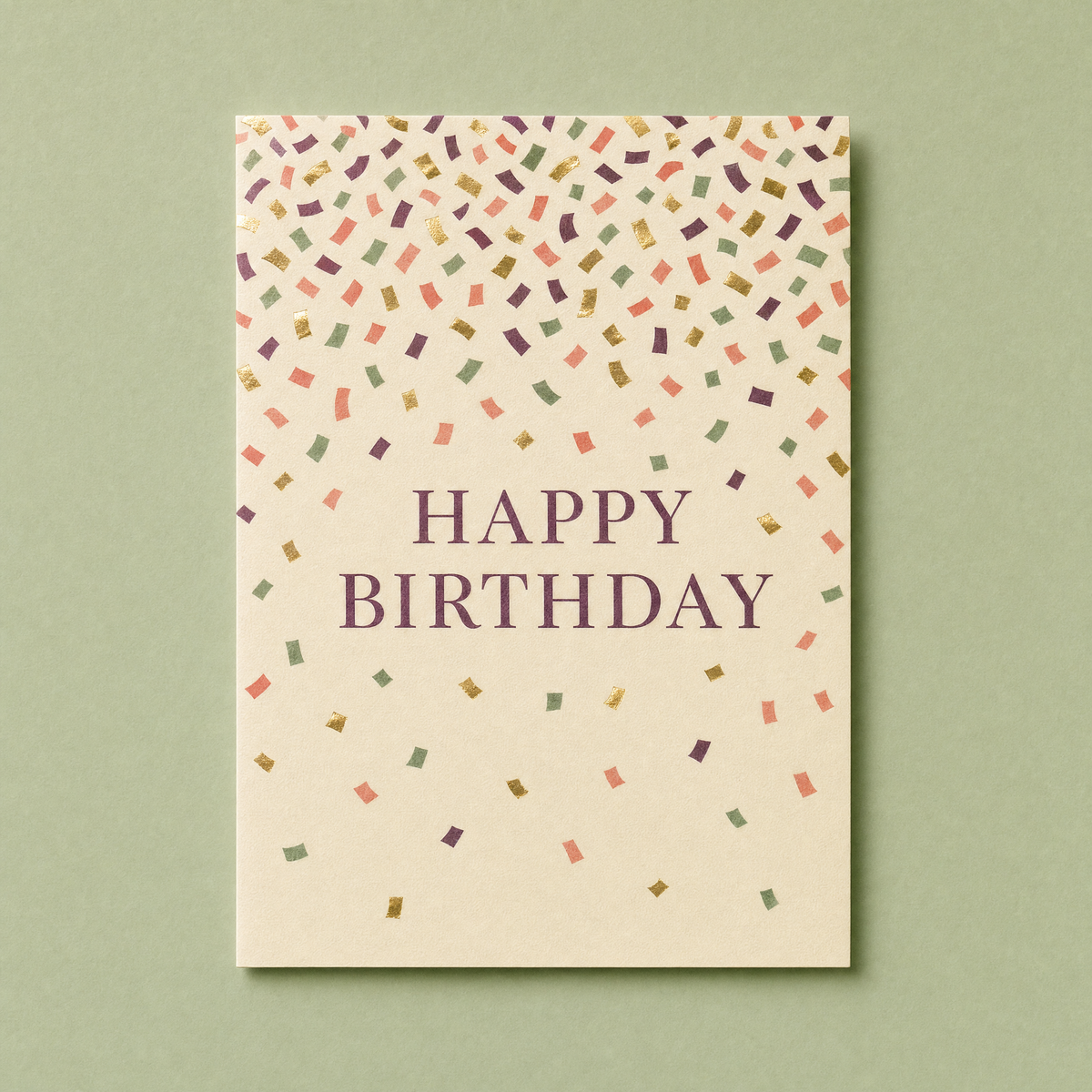 Confetti Birthday card: printed and gold foil confetti slivers scattered across a cream card
